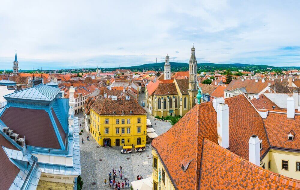 European music festival. Aerial view of the Fo ter - the main square in the hungarian city Sopron including holy trinity column and the Goat church
