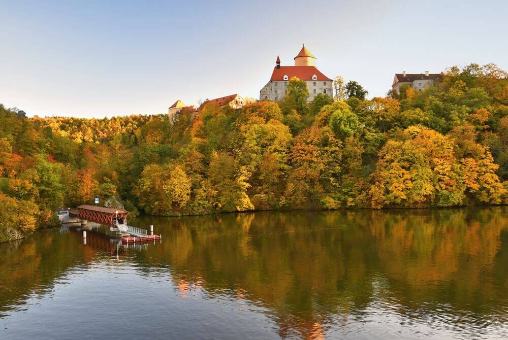 Europe road trip. Beautiful Autumn Landscape with Veveri Castle. Natural colorful scenery with sunset. Brno dam, Czech Republic - Europe.