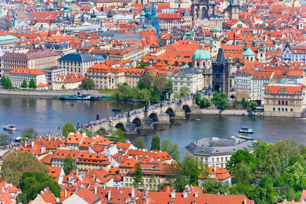 Europe road trip. Charles bridge, Moldau (Vltava) river, Lesser Town and Old town, Prague (UNESCO), Czech republic - view from watchtower - panorama of golden city