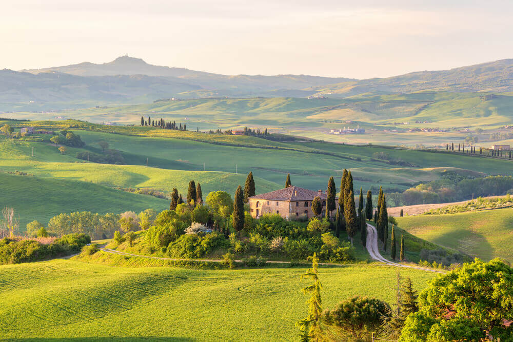 breathtaking landscapes in Europe. House on a hill in Tuscany landscape