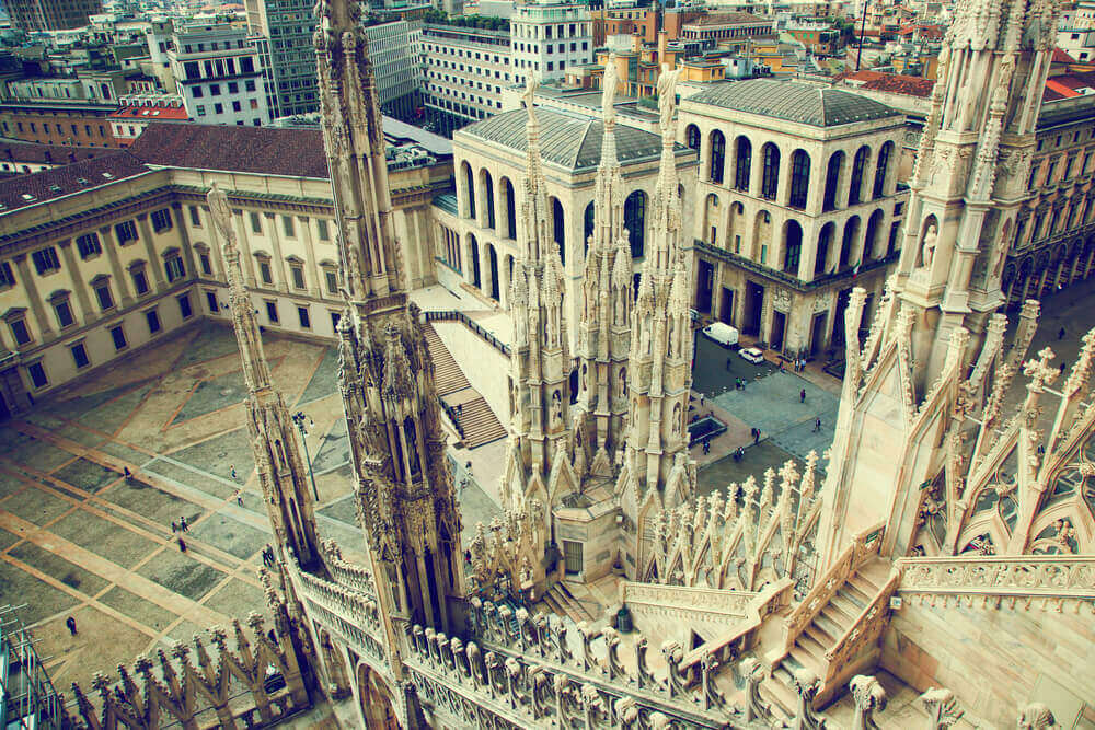 Milan, Italy architecture. View from Milan Cathedral on Royal Palace of Milan - Palazzo Realle. Italy in September