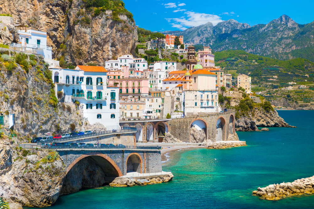Morning view of Amalfi cityscape on coast line of Mediterranean sea. attractions in Italy