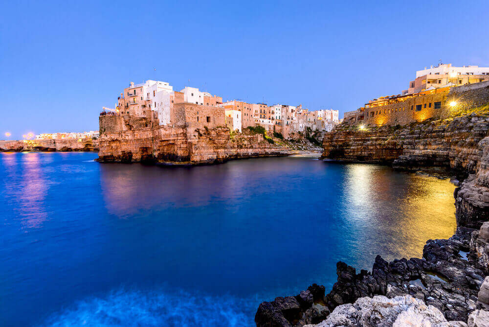 Puglia, Italy. Sunset scenery of Polignano a Mare, town in the province of Bari, Apulia, southern Italia on the Adriatic Sea. Italy in September