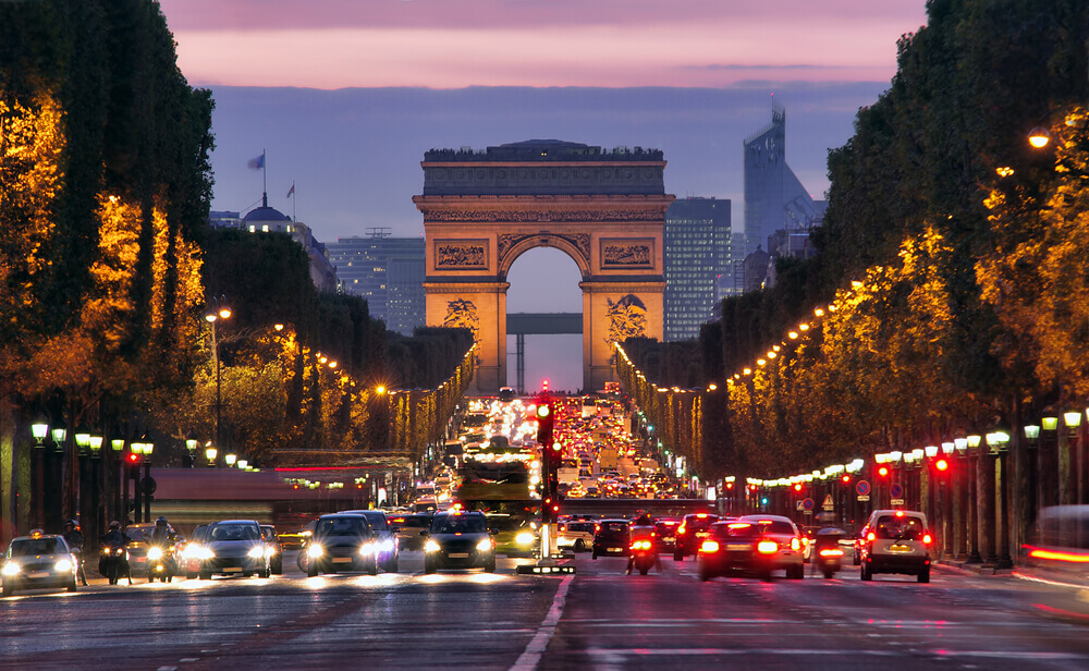 Champs Elysees, Paris at night on your trip to Paris