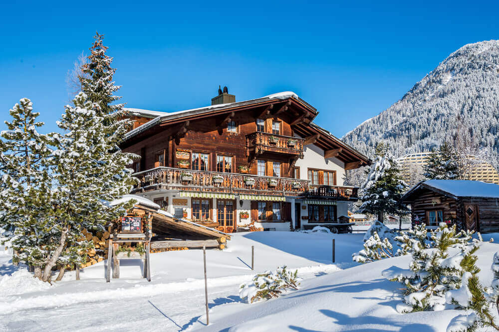 Wood chalet in winter resort Switzerland