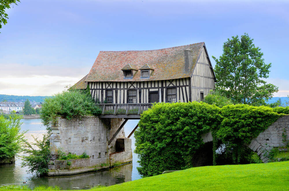 Old mill house on bridge,Vernon, Normandy, France planning a trip to France