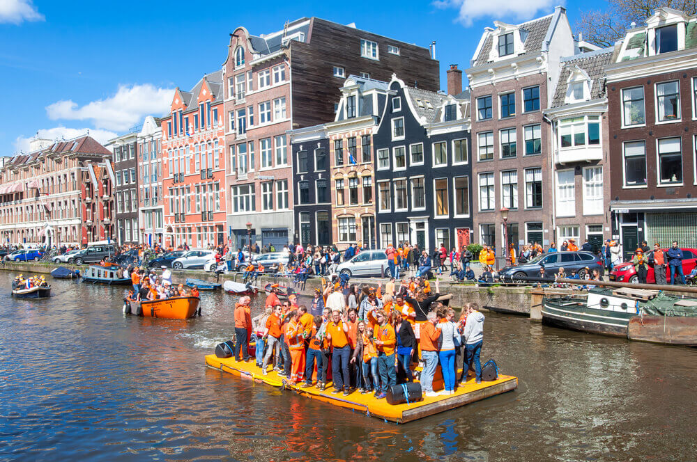 King's day celebrations in Amsterdam canals