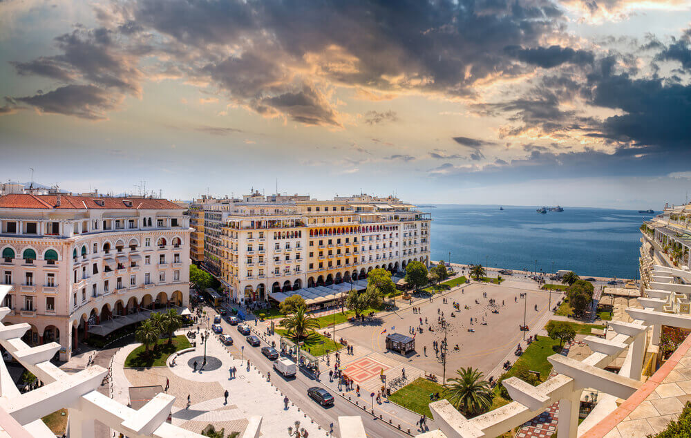 View of Aristotelous Square in Thessaloniki surrounded by buildings. online trip planner.