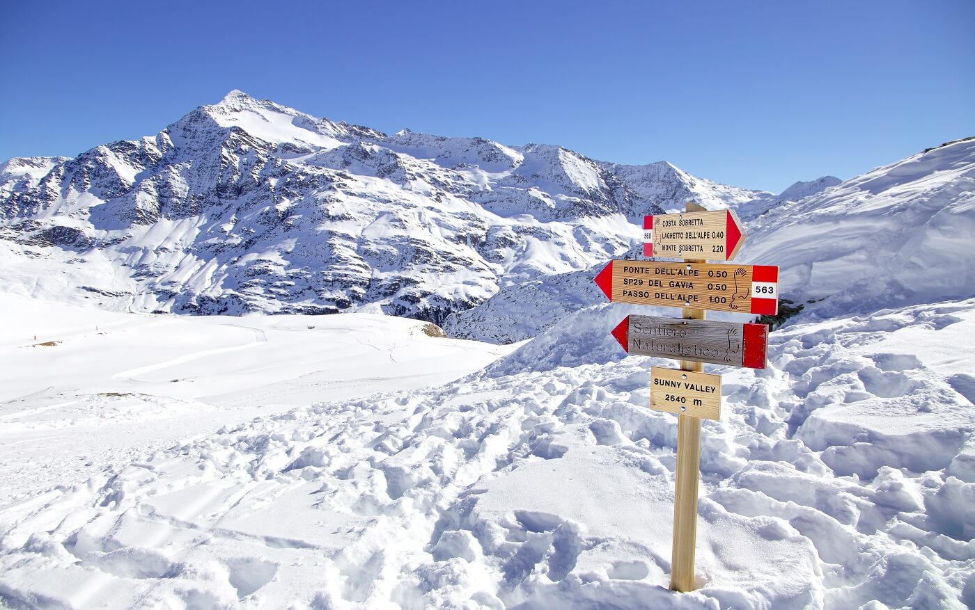 planning a trip to Italy. sign at ski resort in the Italian Alps, Valfurva, Bormio, Scanta Catarina